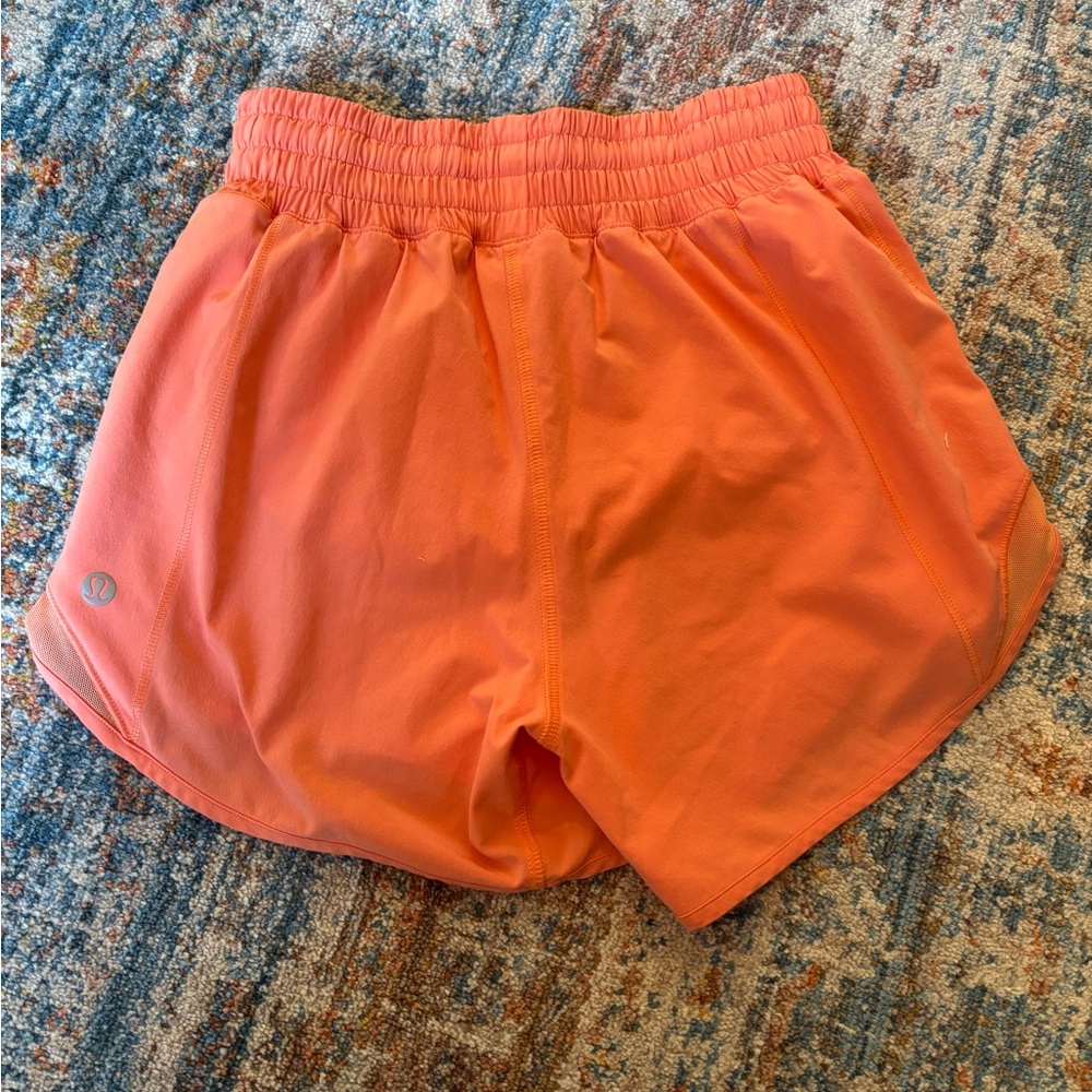 Orange Lululemon hotty hot 4” shorts - Picture 2 of 3